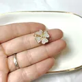 Macro shot of rotatable clover jewelry connector with pave zircon stones and gold plating - Pave Zirconia Clover Connector / Gold No.1