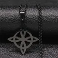 Matte black stainless steel Celtic knot pendant necklace on textured leather background - Black