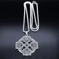 Detailed macro view of Celtic cross pendant with intricate knotwork on black surface - Silver Celtic Cross (Style 1)