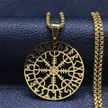 Detail of gold Viking Vegvisir compass pendant with Runes on black leather background - Gold