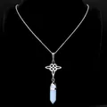 Silver Celtic knot necklace with hexagonal opal crystal pendant on a black bust - Blue