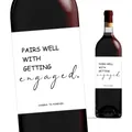 Detail view of engagement wine bottle stickers with PAIRS WELL WITH GETTING ENGAGED text - Engagement Congratulations (QT772-6) / 4pcs