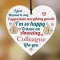 Close-up of heart-shaped wooden plaque with thank you message and black hanging rope - Colleague Appreciation Quotes (QT799-8)