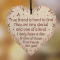 Macro detail of heart-shaped wooden plaque with pink cherry blossom frame and friendship poem - Best Friend Cherry Blossom Quotes (QT799-11)