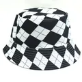 Stylish black and white checkered reversible bucket hat for outdoor sun protection - Black