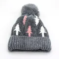 Dark grey knit beanie with pink Christmas tree patterns and a large faux fur pompom - One Size / Gray