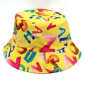 Yellow reversible bucket hat with colorful letter and donut prints for sun protection - M (56-58cm) / Yellow