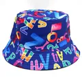Close-up of high-quality digital printing with colorful letters on a blue bucket hat - M (56-58cm) / Blue