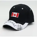 Close-up of Canada flag embroidery and white CANADA lettering on black baseball cap brim - Black and White Canadian Flag Style (Style 3)