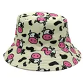 Détail du chapeau bob réversible avec motif de vache rose et taches noires sur toile - M / Beige