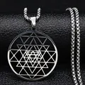 Macro detail of silver Sri Yantra sacred geometry pendant on a beaded steel chain - Silver