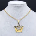 Close-up of gold pentagram and crescent moon pendant necklace on a jewelry display stand - Gold