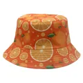 Detail of vibrant orange fruit pattern and stitching on a reversible bucket sun hat - Bright Orange Orange Slice Style (Style 30)