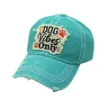 Close-up of distressed cotton baseball cap with DOG Vibes Only embroidery and frayed brim - Adjustable / Emerald Green