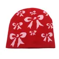 Berretto in maglia rossa con motivo jacquard a fiocco rosa per calore e streetwear - Taglia unica / Rosso