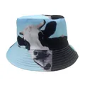Detail view of the light blue bucket hat featuring a realistic black and white cow print texture - Light Blue Realistic Cow Pattern (Style 42)