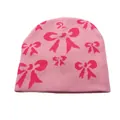Berretto in maglia rosa con motivo jacquard a fiocchi rosa scuro per il caldo inverno - Taglia unica / Rosa
