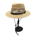Detail of straw sun hat showing breathable mesh panels and brown textured leather strap - Camel Mesh Style