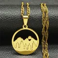 Detail of a gold-plated stainless steel necklace with a hollowed mountain forest pendant - Mountain Forest Style / Gold