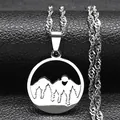 Macro shot of stainless steel layered necklace featuring moon and forest pendant details - Mountain Forest Style / Silver