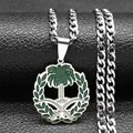 Macro detail of silver stainless steel curb chain with Saudi emblem pendant and green enamel - 60CM / Silver