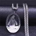 Macro shot of silver Virgin Mary oval medallion with twisted rope chain on black leather - Oval Virgin Mary Style (7412GD) / Silver Style C