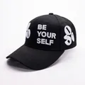 Berretto da baseball in cotone nero con ricamo 3D BE YOUR SELF e dettaglio numero 90 - Regolabile / Nero