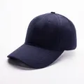 Detailed macro view of dark blue cotton baseball cap with twill fabric texture - Adjustable / Navy Blue