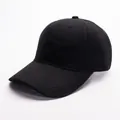 Detail of classic black cotton baseball cap showing twill texture and neat stitching - Adjustable / Black