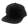 Close-up detail of the 3D embroidered R letter and patterned fabric on the black flat brim hat - Adjustable / Black