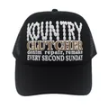 Detailed front view of black trucker hat with Kountry Clutcher vintage letter printing - Black