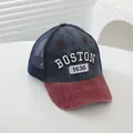 Detail of the breathable mesh back and BOSTON embroidery on this vintage trucker cap - Adjustable / Navy Blue