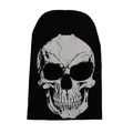 Detail of knitted skull mask featuring distressed graphic and breathable eye cutouts - One Size / Black