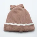 Warm knit beanie for kids with cute bow detail and thick fleece lining in dusty pink - Pink