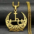 Gros plan du pendentif croissant de lune et croix ankh en acier titane doré sur cuir - Or