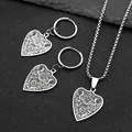 Gothic stainless steel jewelry set with sun and moon engraved heart pendants on black background - Silver