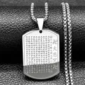 Macro shot of Buddhist scripture engraving on rectangular stainless steel pendant - Silver