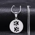 Macro detail of silver stainless steel Yin Yang dog paw necklace pendant with snake chain - 45+5cm / Silver