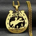 Macro view of golden horseshoe pendant with western cowboy and cactus silhouette details - 60CM / Gold