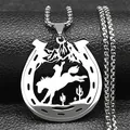 Macro shot of a silver horseshoe pendant featuring a cowboy silhouette and mountain scenery - 60CM / Silver