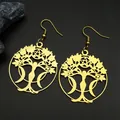 Macro shot of gold tree of life earrings with goddess and pentagram hollow details - Gold Ear Hook