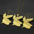 Golden Ancient Egyptian Isis Goddess necklace and earrings set on dark stone background - Gold Necklace And Earrings