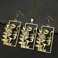 Parure collier et boucles d'oreilles dorée avec portrait ajouré et motif rose - Ensemble collier et boucles d'oreilles / Ensemble Or