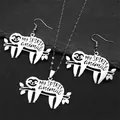 Detail of silver sloth jewelry set featuring engraved 'MY SPIRIT animal' on black stone - Silver Set
