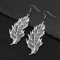 Detailed view of silver leaf feather earrings on a dark textured slate background - Silver Ear Hooks