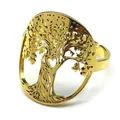Macro detail of golden Tree of Life ring with heart trunk and hollow open design - Gold