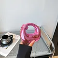 Metallic hot pink horseshoe evening bag with acrylic chain and gold crossbody strap - Pink