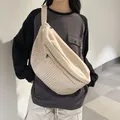 Minimalist beige corduroy crossbody bag with wide shoulder strap and spacious design - White