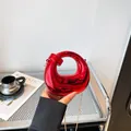 Glossy red horseshoe evening bag with acrylic chain and metallic finish crossbody strap - Spiral Circular Style (6153) / Red