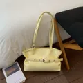 Sac fourre-tout jaune clair en cuir ciré plissé avec œillets métalliques et boucles - Jaune